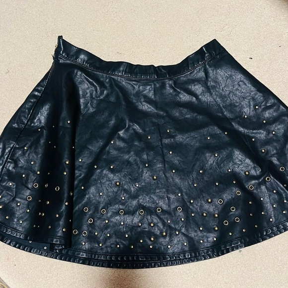 Faux leather Forever21 mini skirt in large with metal embellishments - Picture 2 of 4